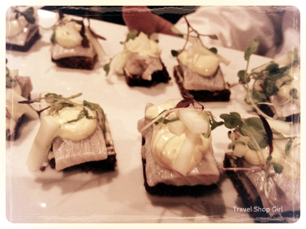 Pickled herring with curry dressing, green apples and spring onions on sweet rye bread